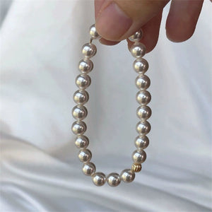 Accessible Luxury Perfect Circle K Gold French Elastic String Pearl Bracelet