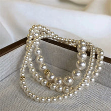 Load image into Gallery viewer, Accessible Luxury Perfect Circle K Gold French Elastic String Pearl Bracelet