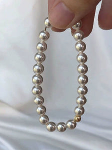 Accessible Luxury Perfect Circle K Gold French Elastic String Pearl Bracelet